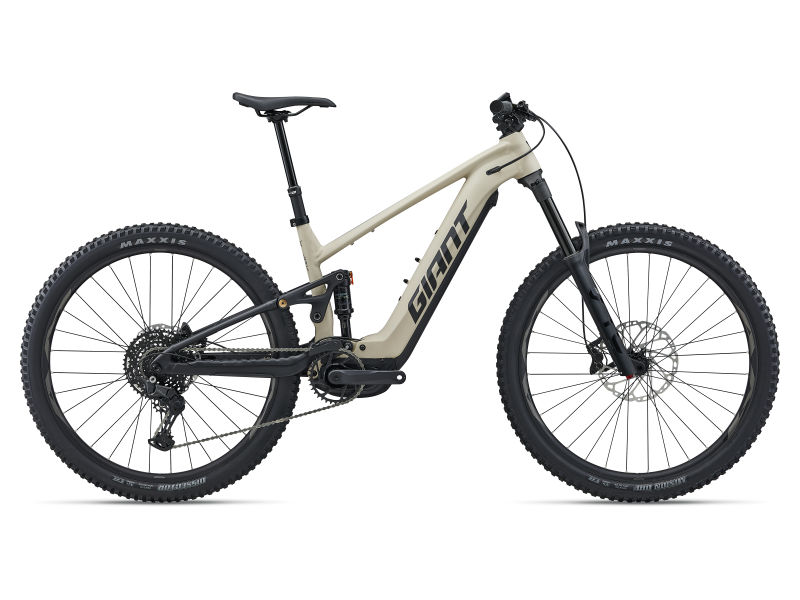 Giant Stance E plus 1 full suspension trail e-bike in almond black, side profile on white background